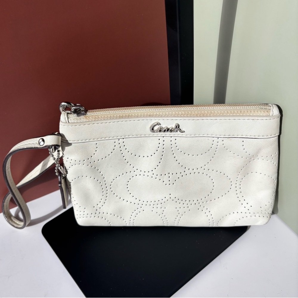 COACH Cream Wristlet with perforated leather